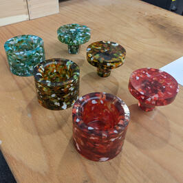 Waxinelichthouder en wandknop